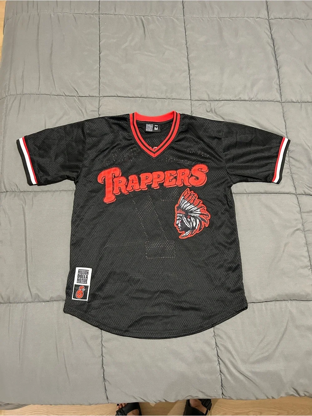 Million Dolla Motive Black & Red Mesh Sports Jersey. Size Medium